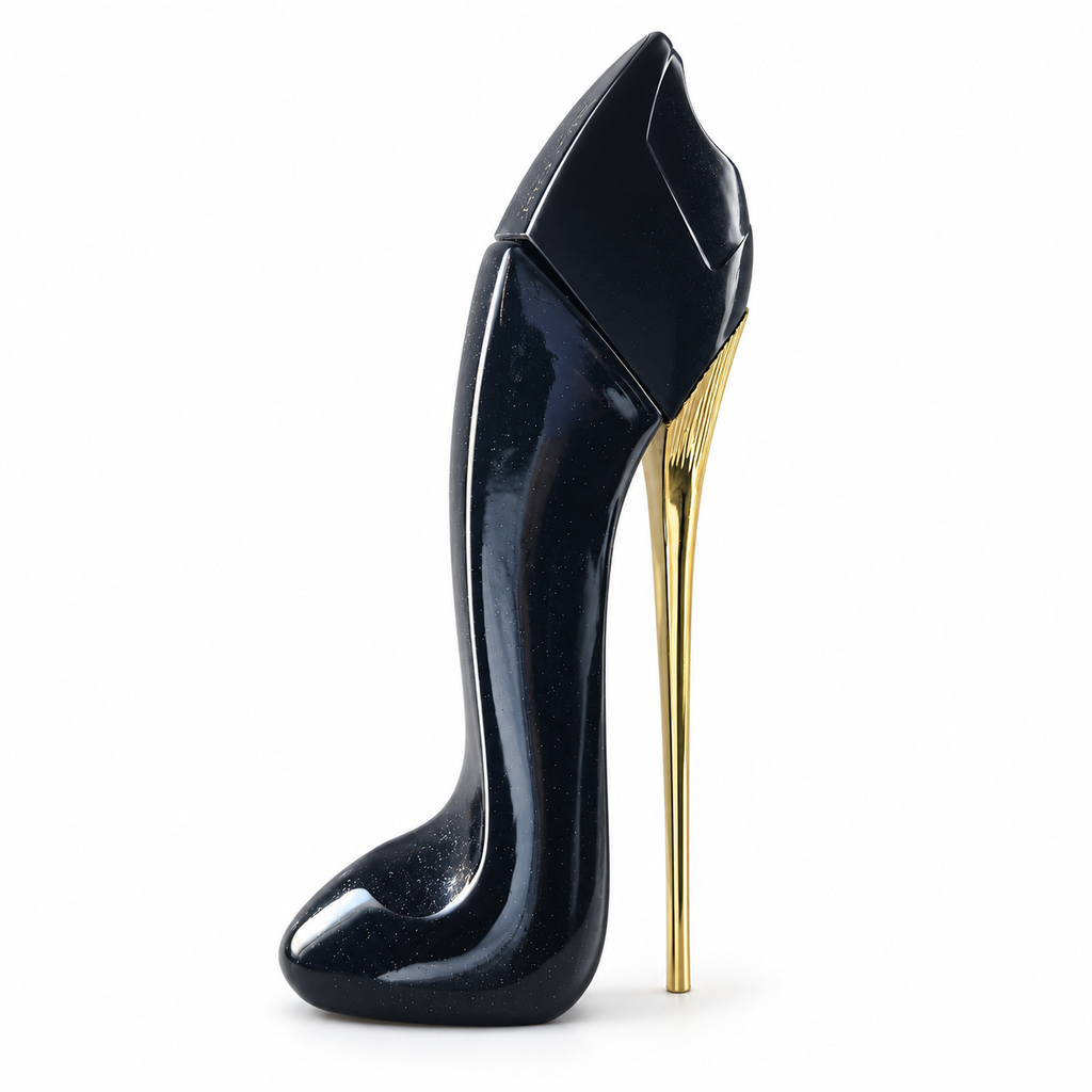 A single high-heeled shoe-shaped perfume bottle with a glossy black finish and a metallic gold stiletto heel, shown against a plain white background.
